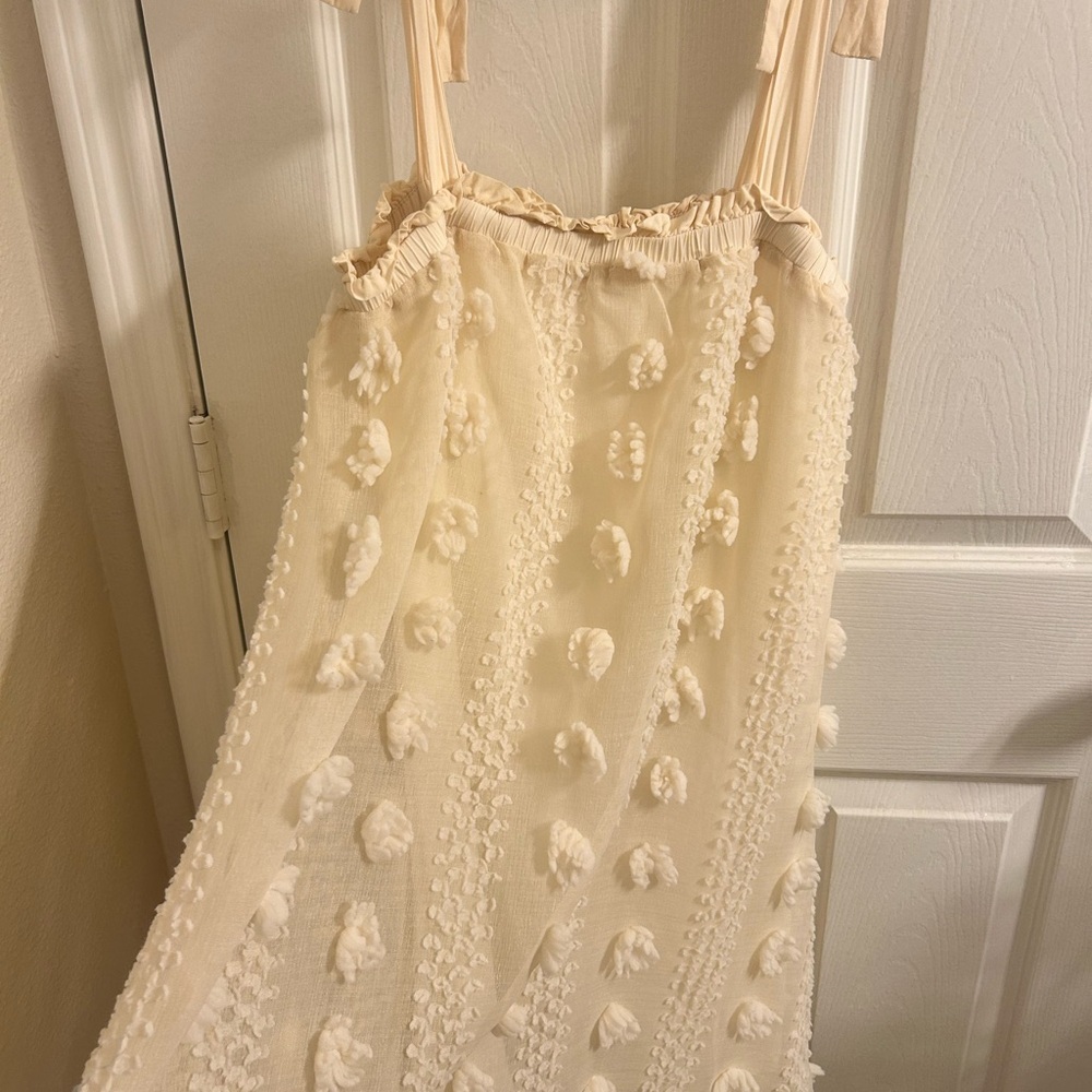Cream Textured Sleeveless Dress from Pink Lily.